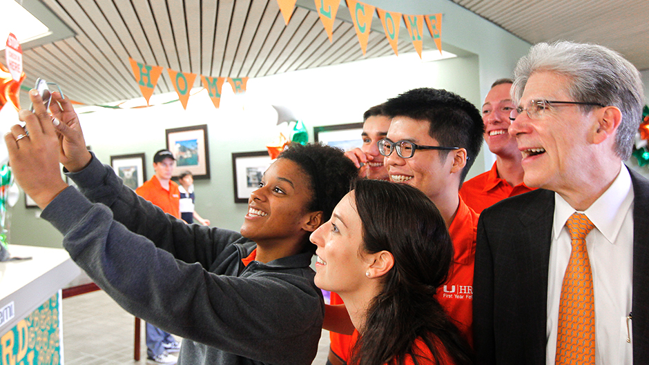 On his first day, Julio Frenk joins a selfie and lends an ear to student leaders.